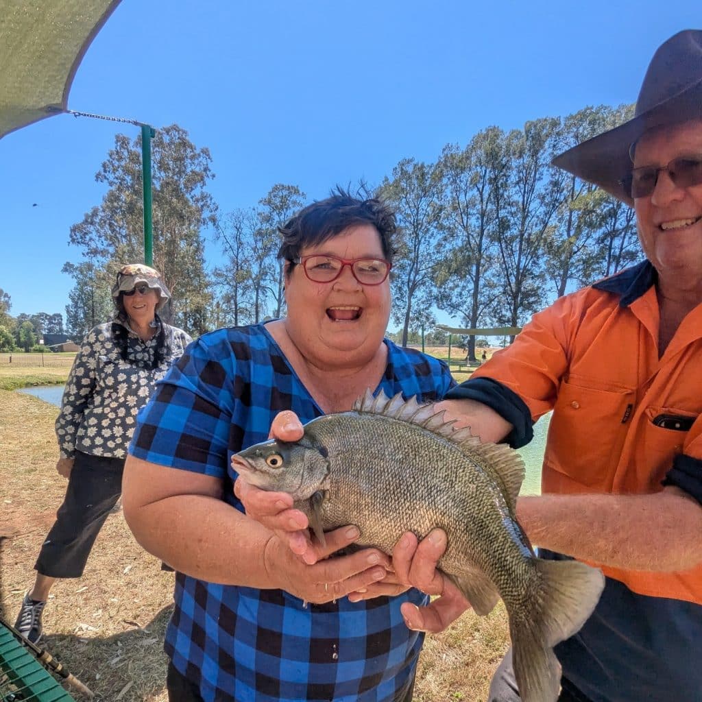 Blooming Connections Participant with a Silver Perch